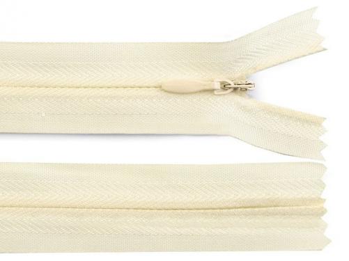 Zip skrytý nedělitelný 3 mm délka 50 cm, barva 103 krémová nejsvět.